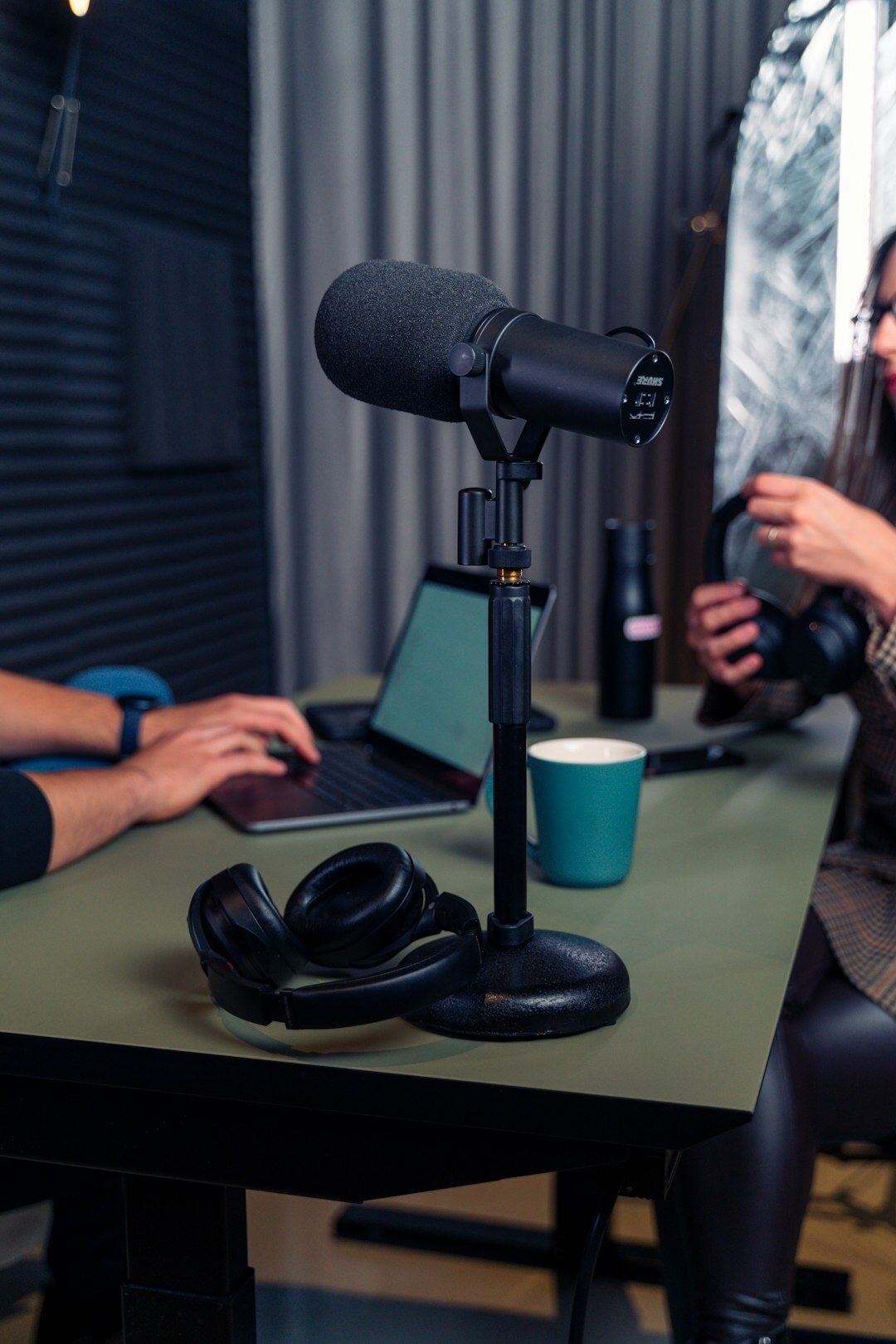 man recording podcast